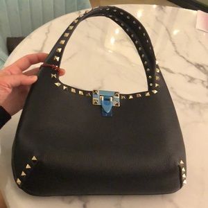 Valentino Garavani Rockstuds hobo bag.